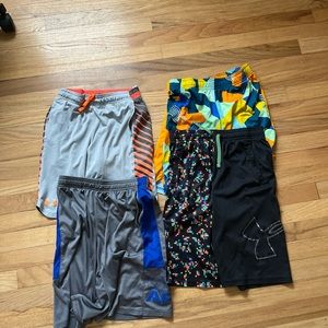 Boys size large under armour shorts 4 pair for 16.00